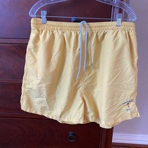 Bright yellow athletic shorts from the Pusser’s Store in Tortola.  Size XXL.